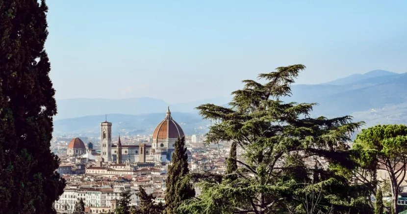 Aerial View of Florences Duomo with City Rooftops and Hills in the Background