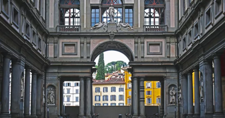Uffizi Gallery courtyard view with historic arches and Florence backdrop