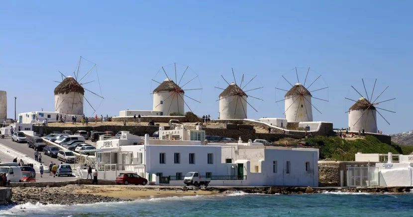 Iconic Windmills Overlooking Mykonos Old Town and the Aegean Sea in Greece