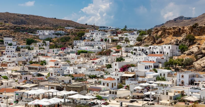 Whitewashed Houses of Lindos Town on the Island of Rhodes Greece Under Blue Skies